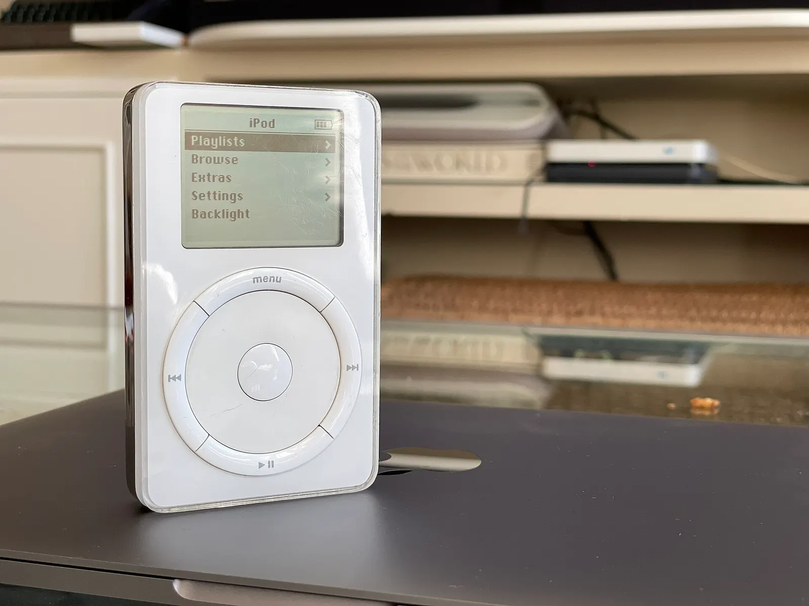 documentary photo of first-generation iPod with mechanical scroll wheel. Creator Alvy; CC BY 4.0; https://commons.wikimedia.org/wiki/File:IPod_1Gen.jpg. Attribution: Alvy, “IPod 1Gen,” CC BY 4.0.