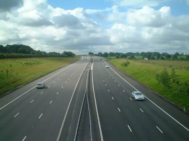 documentary photograph looking south along the M6 Toll Northern Relief Road near Weedon Park Farm. Original page: https://commons.wikimedia.org/wiki/File:M6_Toll_Northern_Relief_Road_-_geograph.org.uk_-_498286.jpg. Photographer: planetearthisblue, 18 July 2007. License: CC BY-SA 2.0. Attribution: “M6 Toll Northern Relief Road” by planetearthisblue, via Geograph Britain and Ireland, CC BY-SA 2.0; unmodified.