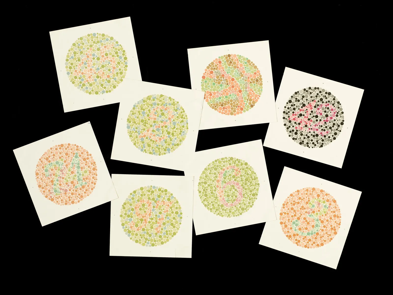 Eight Ishihara color-vision test plates, a later diagnostic context image (not a test of Dalton and not a simulation of his vision). [Original asset page](https://commons.wikimedia.org/wiki/File:Eight_Ishihara_charts_for_testing_colour_blindness,_Europe_Wellcome_L0059164.jpg). Credit: Science Museum, London / Wellcome Images; author metadata: Wellcome Library, London. CC BY 4.0 ([license](https://creativecommons.org/licenses/by/4.0)); attribution: “Science Museum, London / Wellcome Images,” with link to license and indication of edits. Resized to 1600×1199 JPEG; visually checked 2026-10-20.