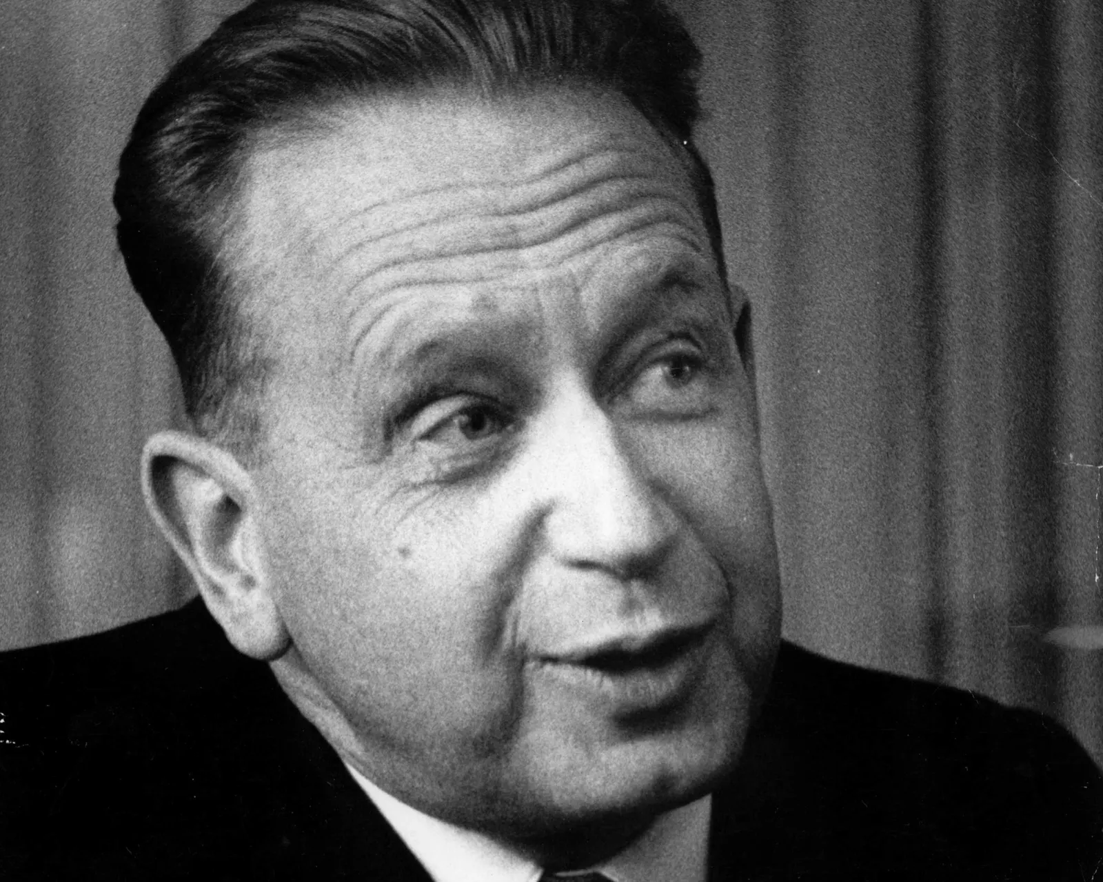 Documentary photograph of Dag Hammarskjöld, created by Caj Bremer. Wikimedia Commons: https://commons.wikimedia.org/wiki/File:Dag-Hammarskjold-1953.jpg; marked public domain under Finnish copyright rules (50 years after creation/publication, as applicable). Territorial basis may differ elsewhere. Credited as Caj Bremer via Wikimedia Commons. Original downloaded unchanged.