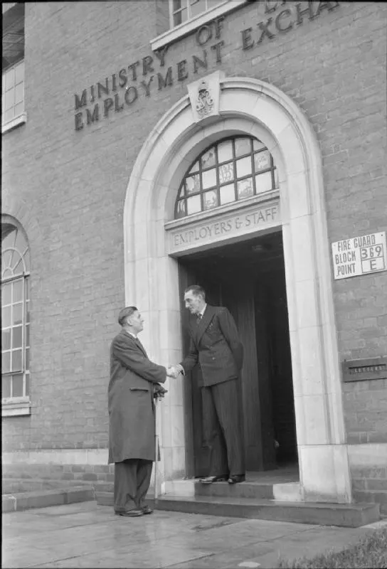 William Vaughan outside the Employment Exchange after approval to open a bookshop on Tottenham Court Road, London, 1945; contextual documentary image about book retail, not the Guinness book. Ministry of Information Photo Division Photographer, Imperial War Museums / Wikimedia Commons, https://commons.wikimedia.org/wiki/File:A_Soldier_Opens_a_Shop-_Trooper_William_Vaughan_Opens_a_Book_Shop_on_Tottenham_Court_Road,_London,_England,_UK,_1945_D23660.jpg. UK Crown copyright had expired because the photo predates 1 June 1957; Commons documents the public-domain status. Attribution: Ministry of Information Photo Division Photographer / IWM, “A Soldier Opens a Shop… D23660,” via Wikimedia Commons (public domain). Checked 2026-10-18.