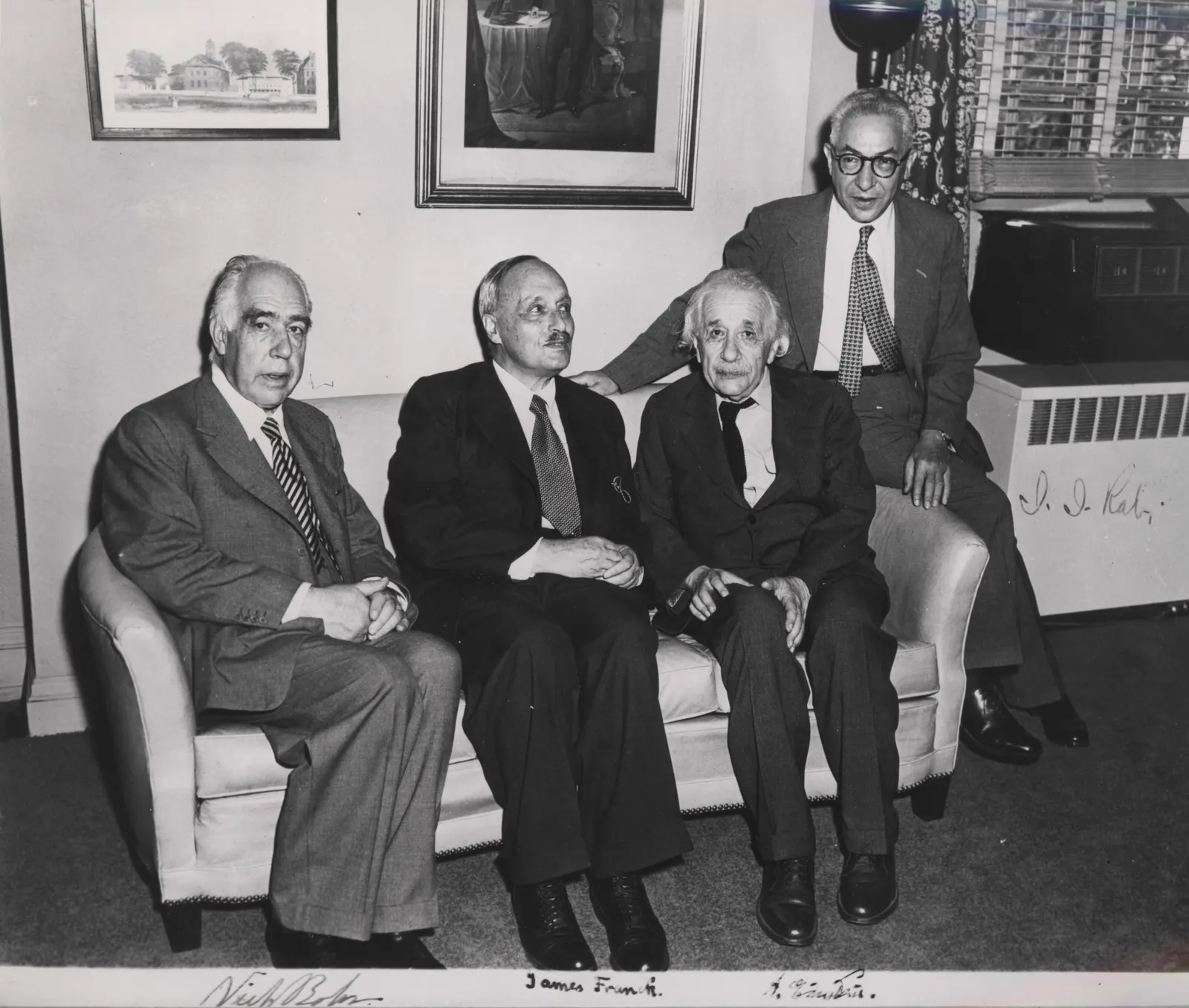 Smithsonian photograph of Niels Bohr, James Franck, Albert Einstein and Isidor Isaac Rabi together in 1954. Wikimedia Commons: https://commons.wikimedia.org/wiki/File:Portrait_of_Albert_Einstein,_Niels_Bohr,_James_Franck_and_Rabi.jpg; Smithsonian Institution marked “No restrictions.” Attribution: Smithsonian Institution, via Wikimedia Commons. Original file, unchanged.