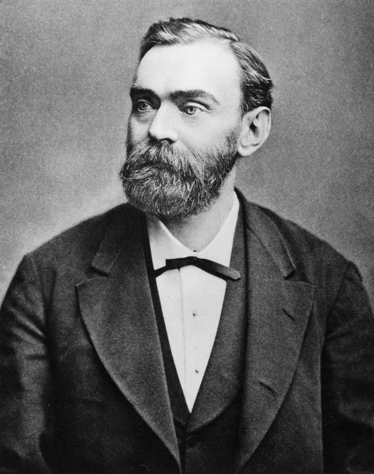 documentary portrait photograph of Alfred Nobel, circa 1883. Photographer unknown; Commons records the source as the Science Museum and the Swedish Inventors Museum and marks it public domain under anonymous-work rules in the EU and qualifying jurisdictions. [Wikimedia Commons file page](https://commons.wikimedia.org/wiki/File:AlfredNobel2.jpg). No edits.