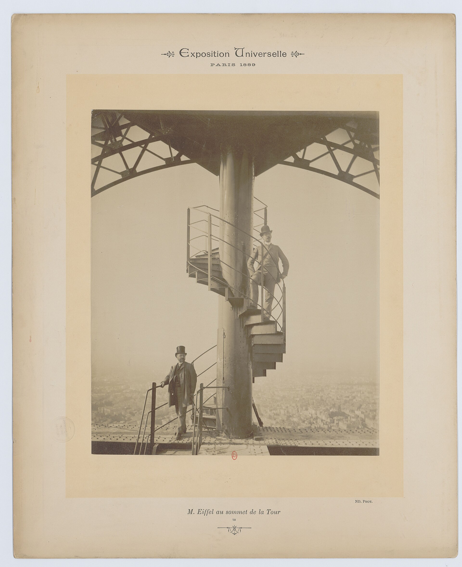 Archival photograph of Gustave Eiffel on the tower in 1889. Original page: https://commons.wikimedia.org/wiki/File:Exposition_Universelle_Paris_1889._M._Eiffel_au_sommet_de_la_Tour_-_btv1b11600062x.jpg . Creator: Neurdein frères; source: Bibliothèque nationale de France, Gallica. Public domain in France and the United States; attribution remains mandatory, and is included here. Downloaded 1920-pixel Commons thumbnail.