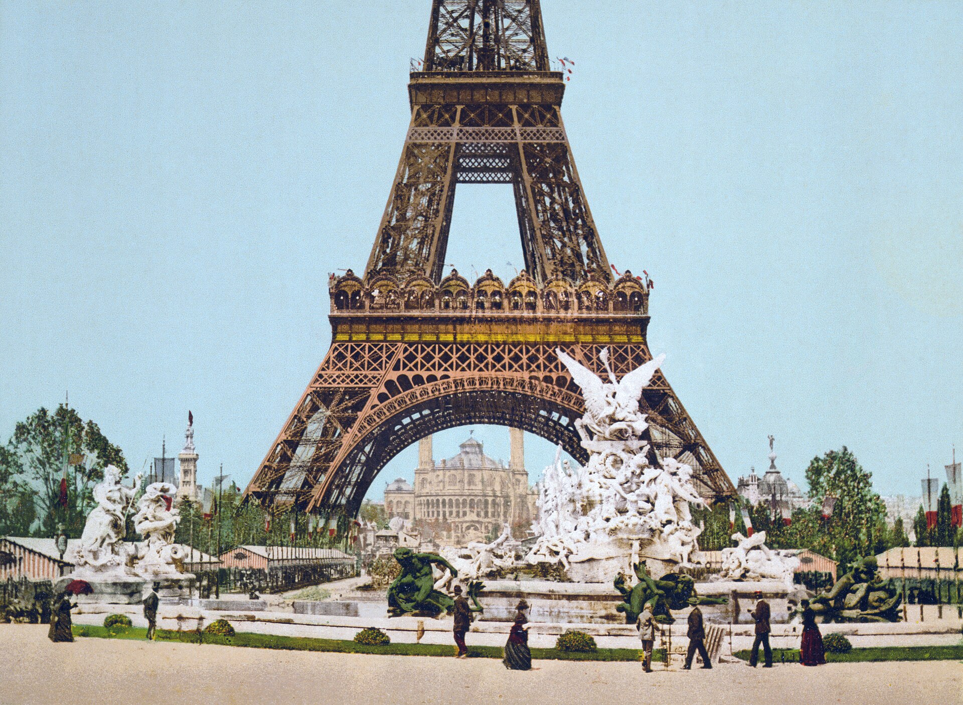 Colorized photochrom view of the completed tower and fountain at the 1889 exposition. Original page: https://commons.wikimedia.org/wiki/File:Eiffel_Tower_and_fountain,_Exposition_Universal,_1889,_Paris,_France.jpg . Source: Detroit Publishing Company / Library of Congress; no known copyright restrictions, public domain. Credit included here; downloaded Commons thumbnail without further edits.