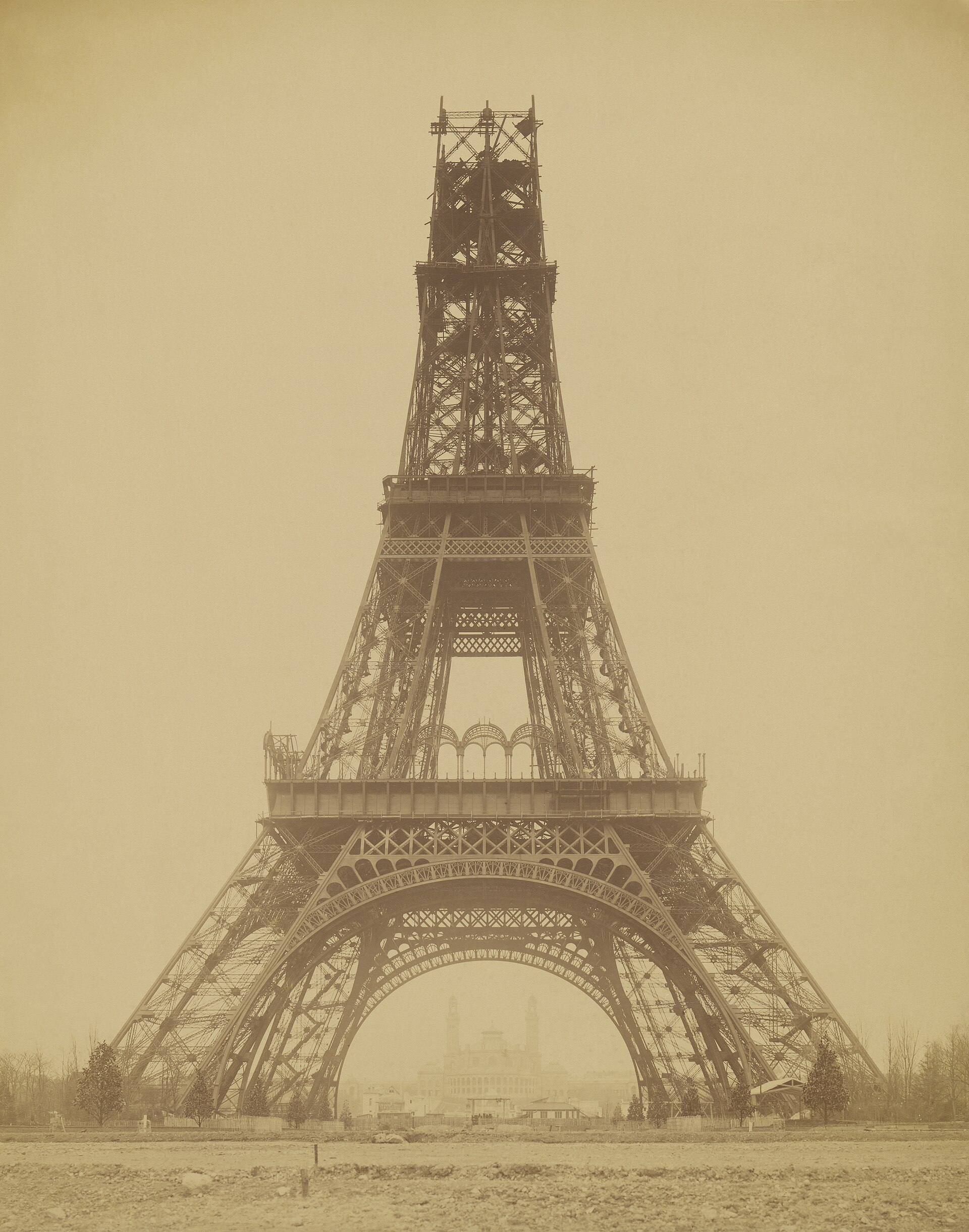 Louis-Émile Durandelle photograph of the tower under construction in 1888. Original page: https://commons.wikimedia.org/wiki/File:Louis-Emile_Durandelle,_The_Eiffel_Tower_-_State_of_the_Construction,_1888.jpg . Source collection: Getty Research Institute Open Content; public domain / Public Domain Mark, no known copyright restrictions. Creator credited; downloaded 1920-pixel Commons thumbnail.