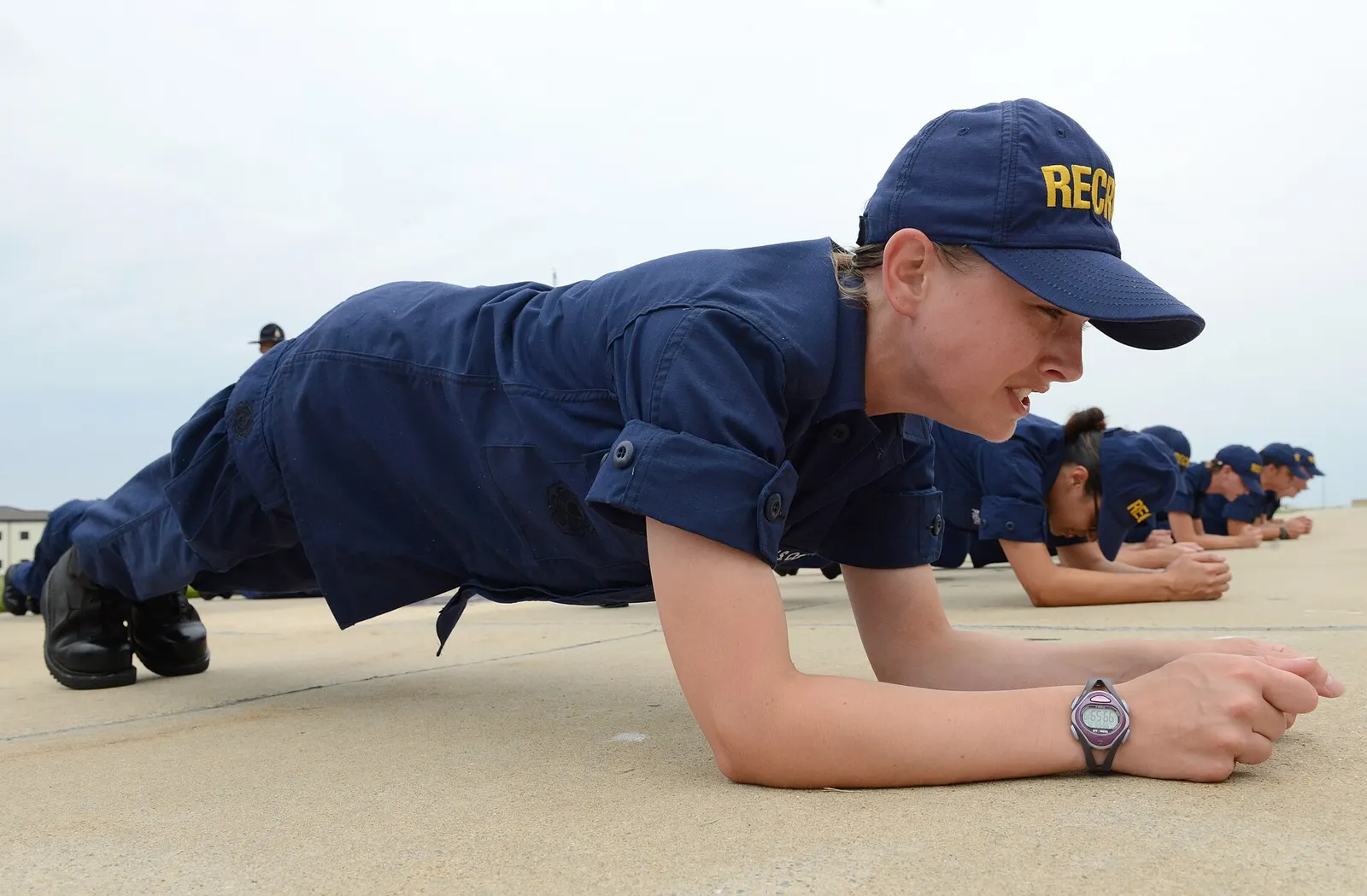U.S. Coast Guard recruit performing a plank during incentive training at Cape May, New Jersey, 31 July 2013; photographer Chief Warrant Officer Donnie Brzuska; U.S. federal government public domain. Original page: https://commons.wikimedia.org/wiki/File:A_U.S._Coast_Guard_recruit,_assigned_to_Company_Oscar_188,_performs_a_plank_during_incentive_training_at_Coast_Guard_Training_Center_Cape_May_in_Cape_May,_N.J.,_July_31,_2013_130731-G-WA946-943.jpg. Credit: U.S. Coast Guard photo by Chief Warrant Officer Donnie Brzuska.