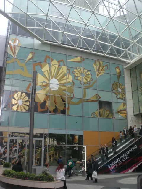 documentary photograph of an escalator at Westfield Shopping Centre W12 in London, 10 June 2009; contextual example of a shopping-centre escalator, not the Burwood escalators or Joachim’s attempt. Original page: https://commons.wikimedia.org/wiki/File:Escalator_at_Westfield_Shopping_Centre_W12_-_geograph.org.uk_-_1351862.jpg. Creator R Sones. CC BY-SA 2.0 (https://creativecommons.org/licenses/by-sa/2.0/). Attribution: R Sones, “Escalator at Westfield Shopping Centre W12,” CC BY-SA 2.0, via Geograph/Wikimedia Commons. Original JPEG, unchanged.