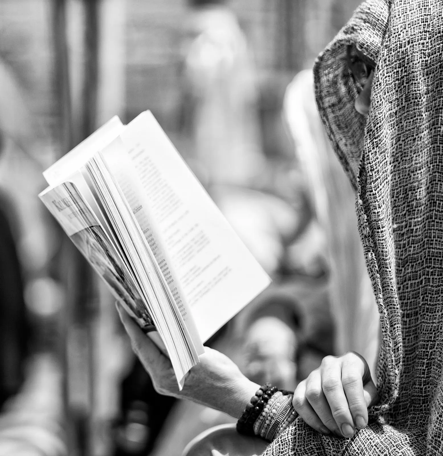 a person reading; contextual image, not a depiction of the survey. Original: https://commons.wikimedia.org/wiki/File:Person_reading_a_book.jpg. Photographer Christopher Michel; CC BY 2.0. Required attribution: “Christopher Michel, CC BY 2.0, via Wikimedia Commons.” Reused unchanged.