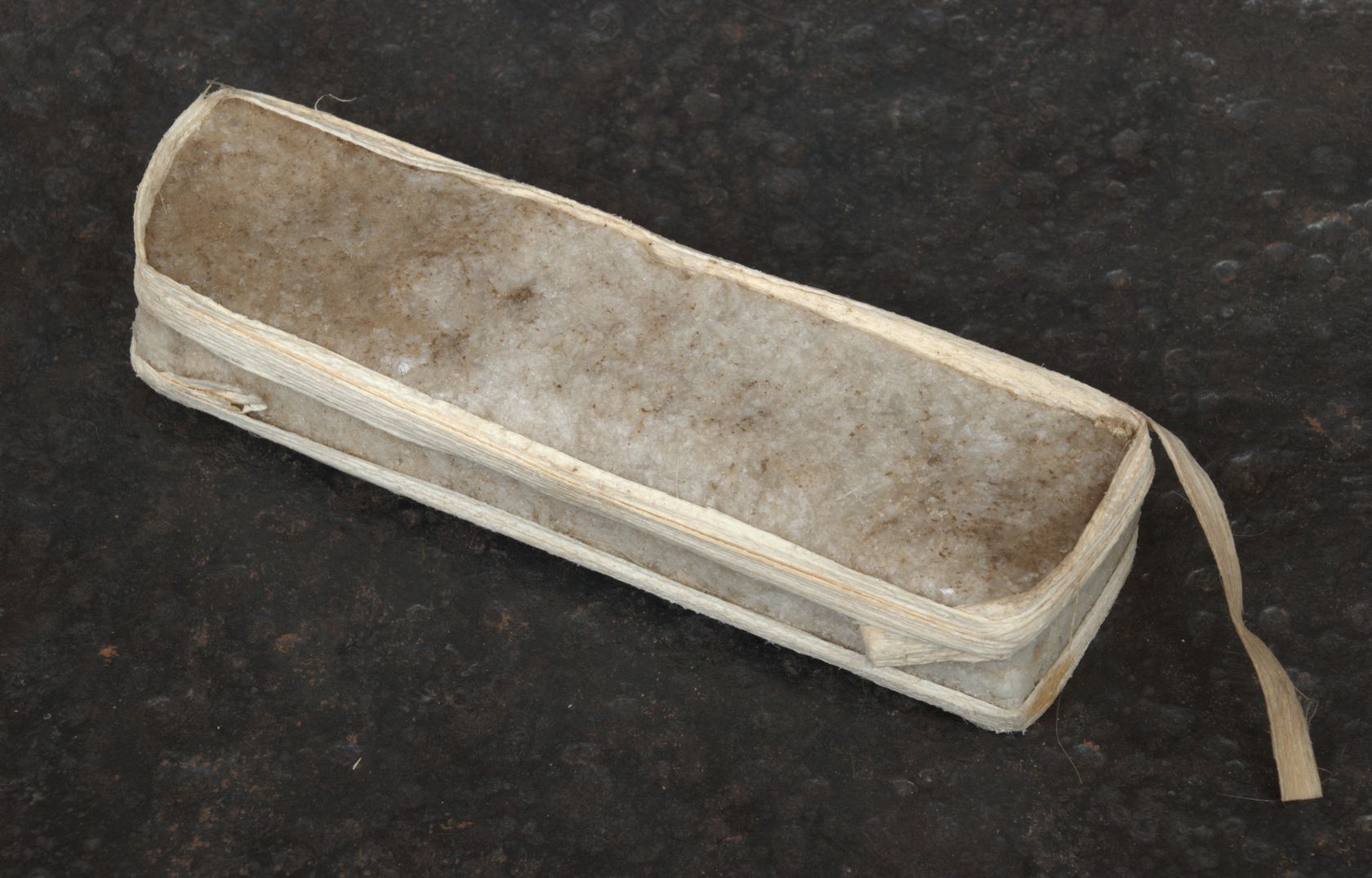 a rectangular amole salt bar, described as historic Ethiopian currency.