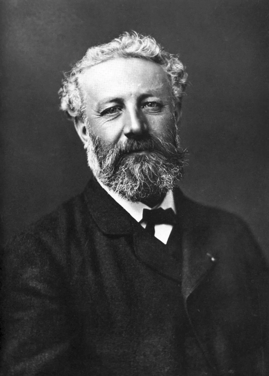 Documentary portrait of Jules Verne, photographed by Félix Nadar circa 1878. Source: https://commons.wikimedia.org/wiki/File:F%C3%A9lix_Nadar_1820-1910_portraits_Jules_Verne.jpg. Public domain; unchanged.