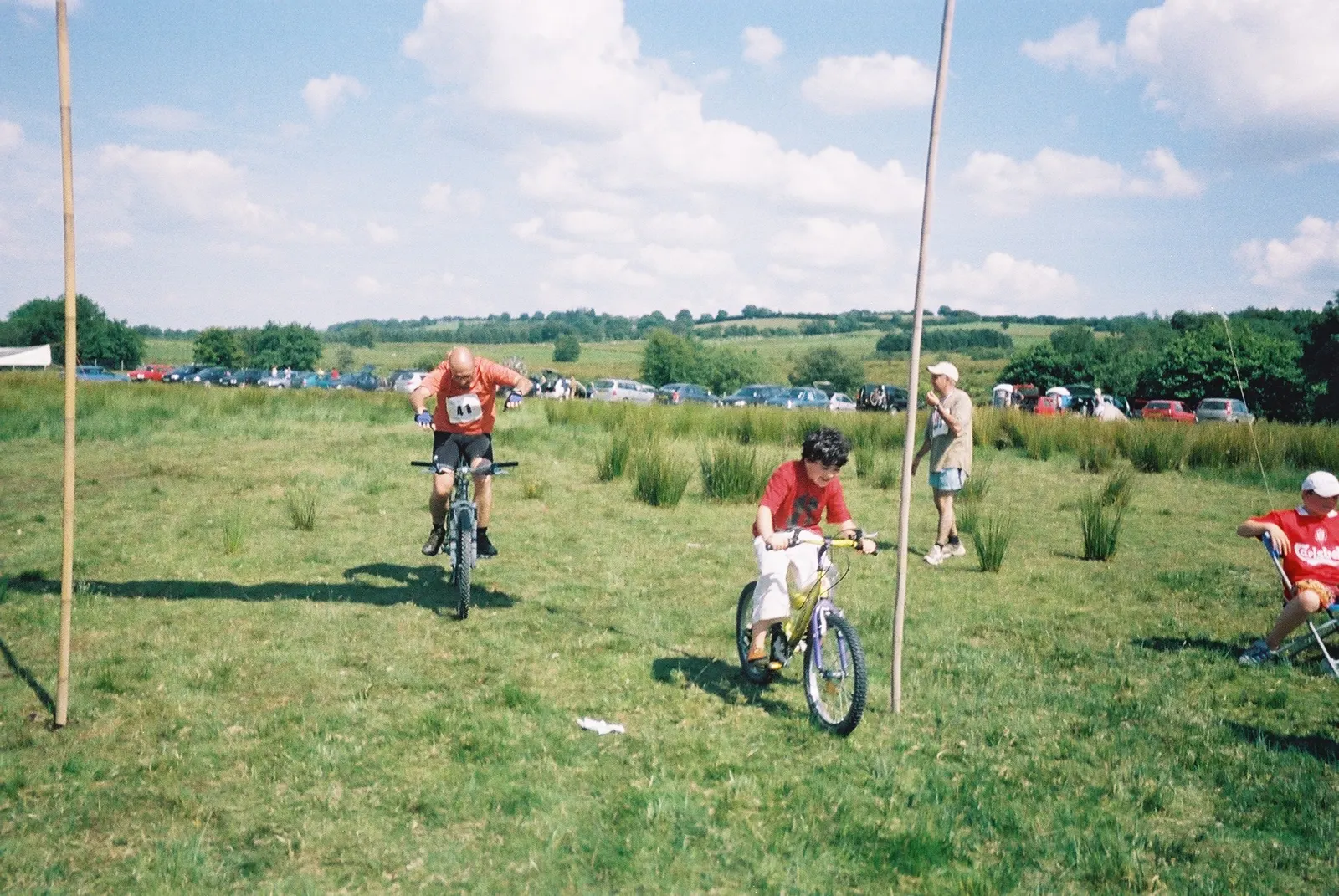 documentary photograph showing a bicycle leg at a World Bog Snorkelling event in Wales; captured by Russell Layberry (Commons username Roosterman), original image page says 20 June 2006 (upload date) and identifies Jon Atkinson. Contextual event image; it is not identified as Daniel Bent or as his record attempt. Licensed CC BY-SA 3.0 (also GFDL); attribution: “Russell Layberry (Roosterman) / CC BY-SA 3.0”; unedited. [Original file page](https://commons.wikimedia.org/wiki/File:J_atkinson_bog1.jpg).