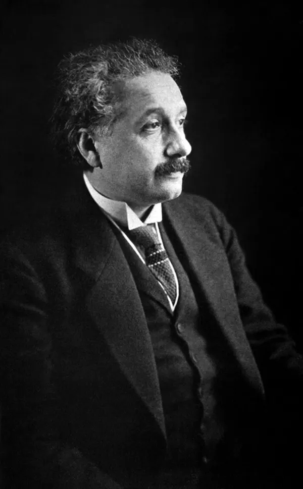 Albert Einstein lecturing in Vienna in 1921. Ferdinand Schmutzer (1870–1928); public domain mark on the Commons file page, including Austria and the United States. Original Commons file, no edits. Source: [Wikimedia Commons file page](https://commons.wikimedia.org/wiki/File:Albert-einstein-image.jpg). Checked 18 October 2026.