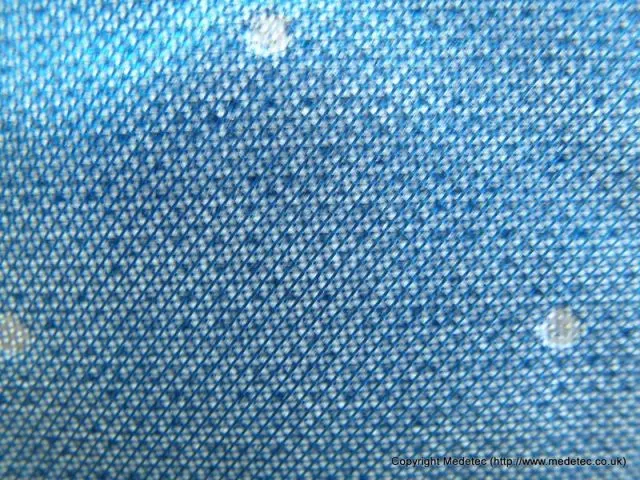 Silver-containing Acticoat dressing close-up; Medetec notice preserved.