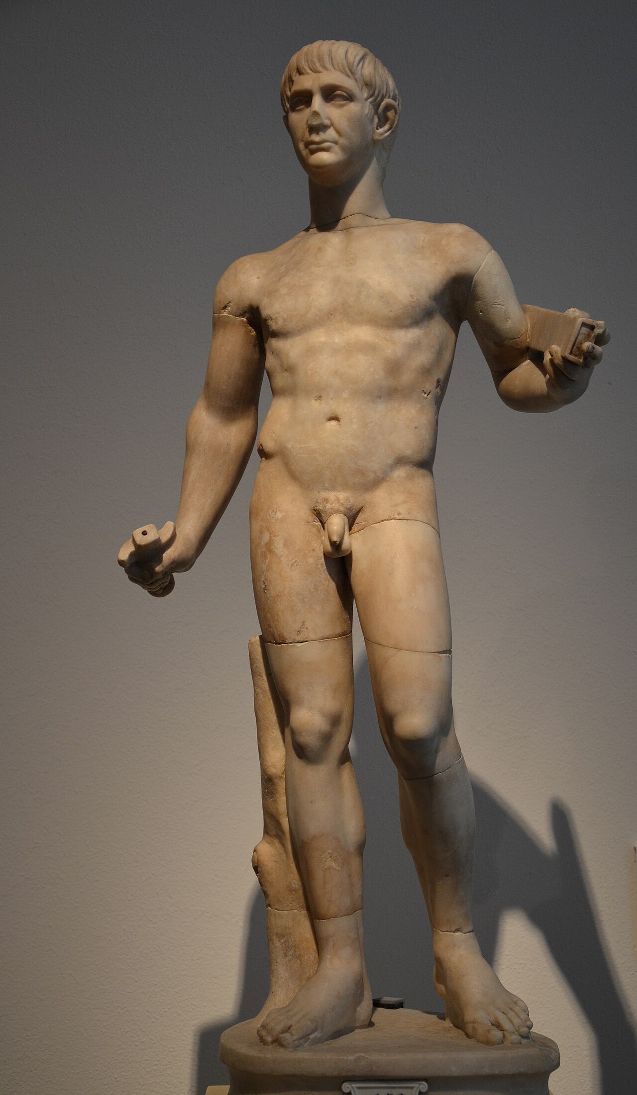 Roman statuette at Berlin's Altes Museum; the catalog description notes that its Trajan portrait head and torso did not originally belong together.