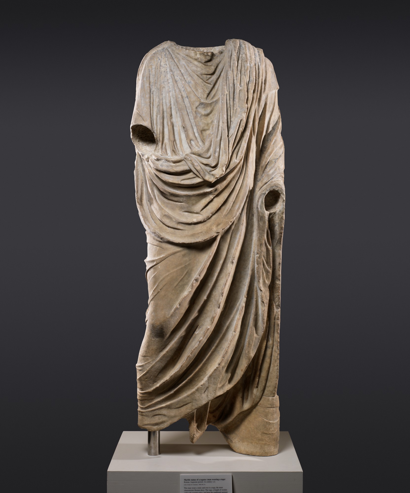 Marble statue of a Roman togatus, 1st century CE, The Metropolitan Museum of Art, public domain. https://www.metmuseum.org/art/collection/search/247105