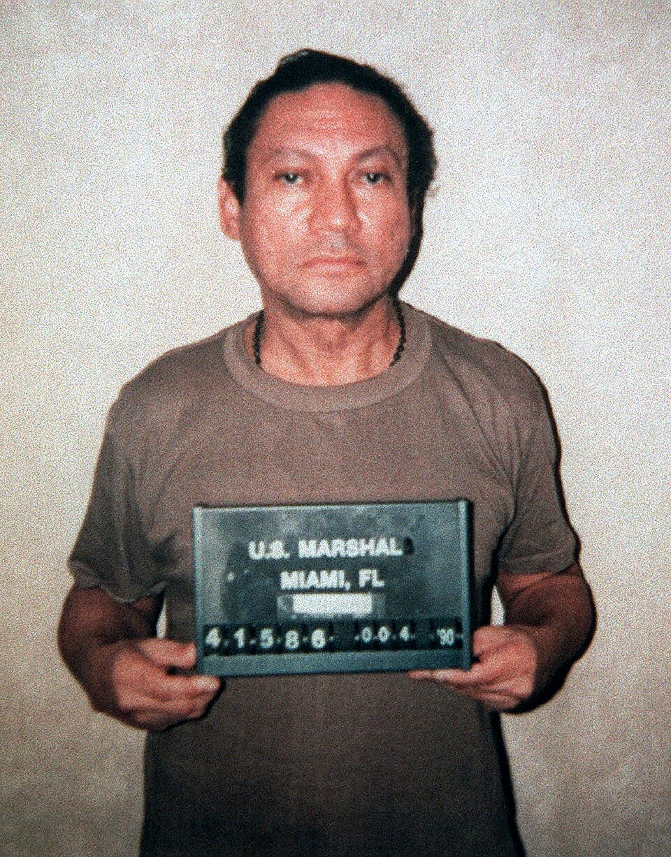 U.S. Marshal photo of Manuel Noriega after his capture on January 4, 1990, not at the nunciature. Photographer: U.S. Marshals Service, Miami. U.S. federal-government work; public domain in the United States. Wikimedia Commons: https://commons.wikimedia.org/wiki/File:Manuel_Noriega_1990_U.S._Marshal_mugshot.jpg. No attribution required; attribution retained here for provenance. Resized download (960 × 1,227); no crop.