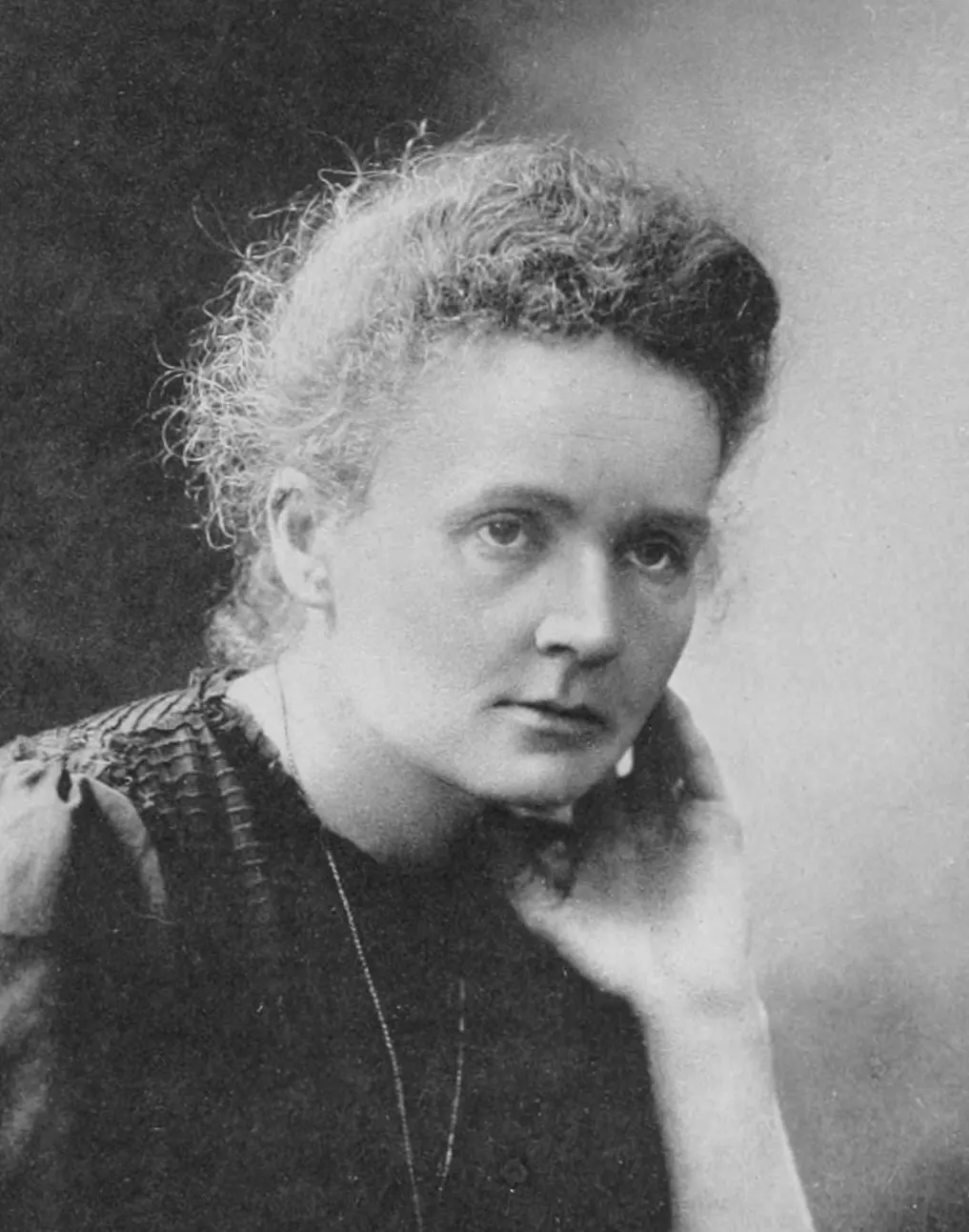 documentary portrait of Marie Curie, photographed in 1911 and published in Sweden in 1912. Photographer: Fotograv. – Generalstabens Litografiska Anstalt Stockholm. Source: [Wikimedia Commons file page](https://commons.wikimedia.org/wiki/File:Marie_Curie_(Nobel-Chem).jpg), image derived from the Nobel Prize archives and a 1912 publication. Public domain in Sweden under the stated photographic/publication rules; Public Domain Mark shown; note the stated jurisdiction caveats. No edits; checked 18 October 2026.