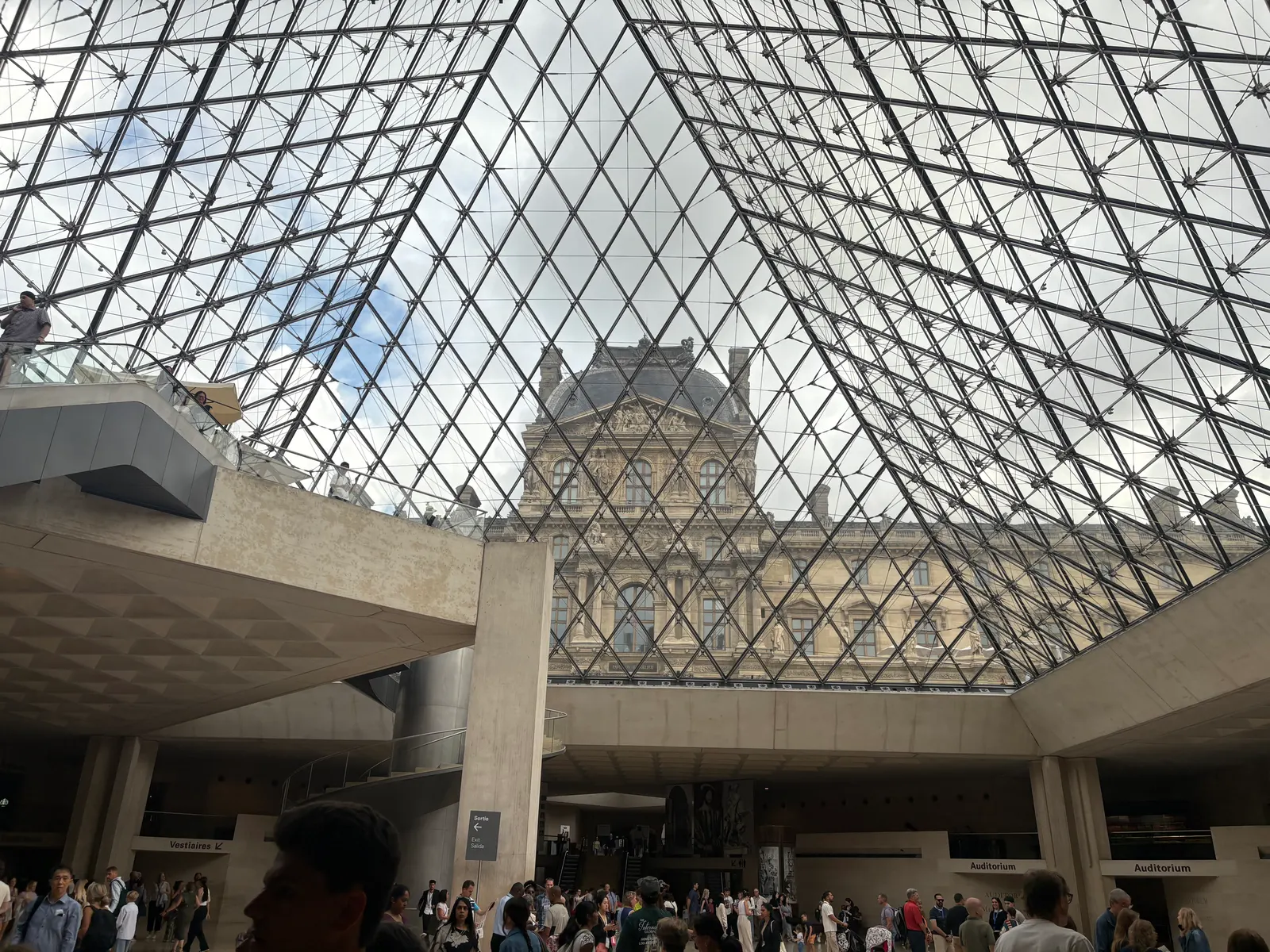Louvre interior and pyramid, photograph by Dmarcovitz (2025), CC0 1.0. [Source and rights](https://commons.wikimedia.org/wiki/File:Inside_the_Louvre_Pyramid_July_2025.jpg). Visually checked 2026-10-28.