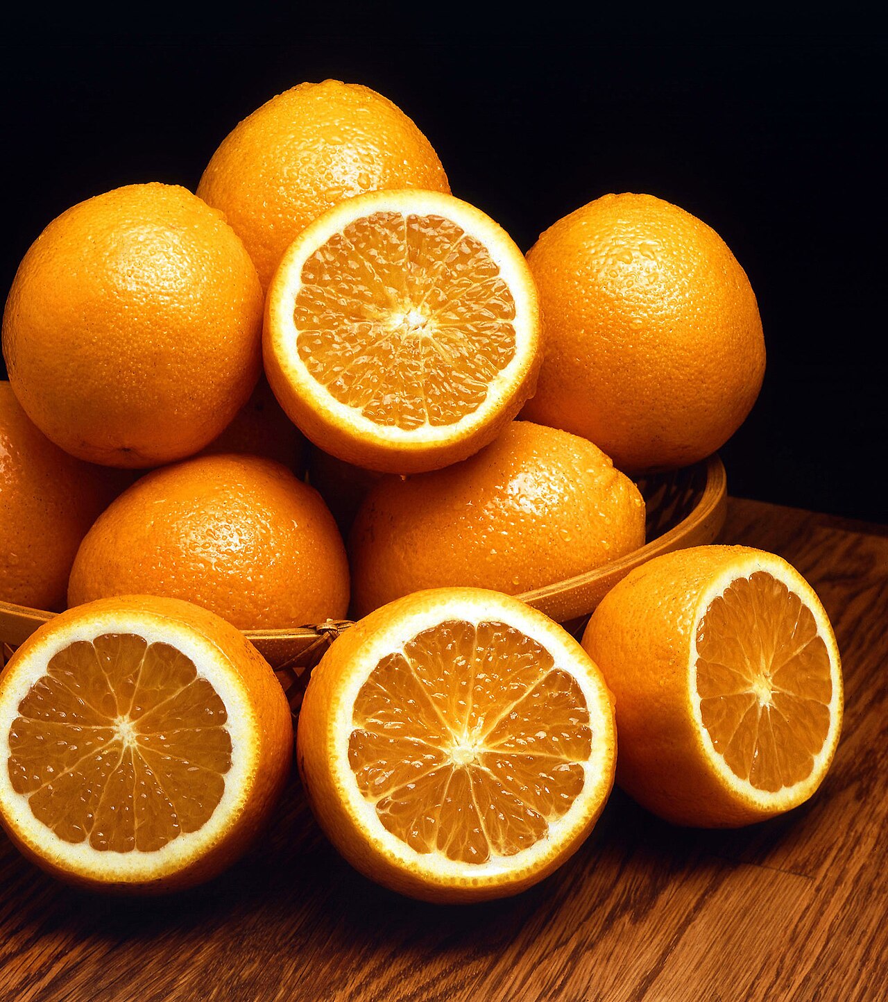 Ambersweet oranges , a new cold-resistant orange variety.. Original file: [Ambersweet oranges.jpg](https://commons.wikimedia.org/wiki/File%3AAmbersweet_oranges.jpg). Creator: Not identified on the Commons file page. License: Public domain (https://commons.wikimedia.org/wiki/File%3AAmbersweet%20oranges.jpg). Attribution: Not identified on the Commons file page. Downloaded from the verified Commons file page; unaltered image. Checked 2026-10-25.