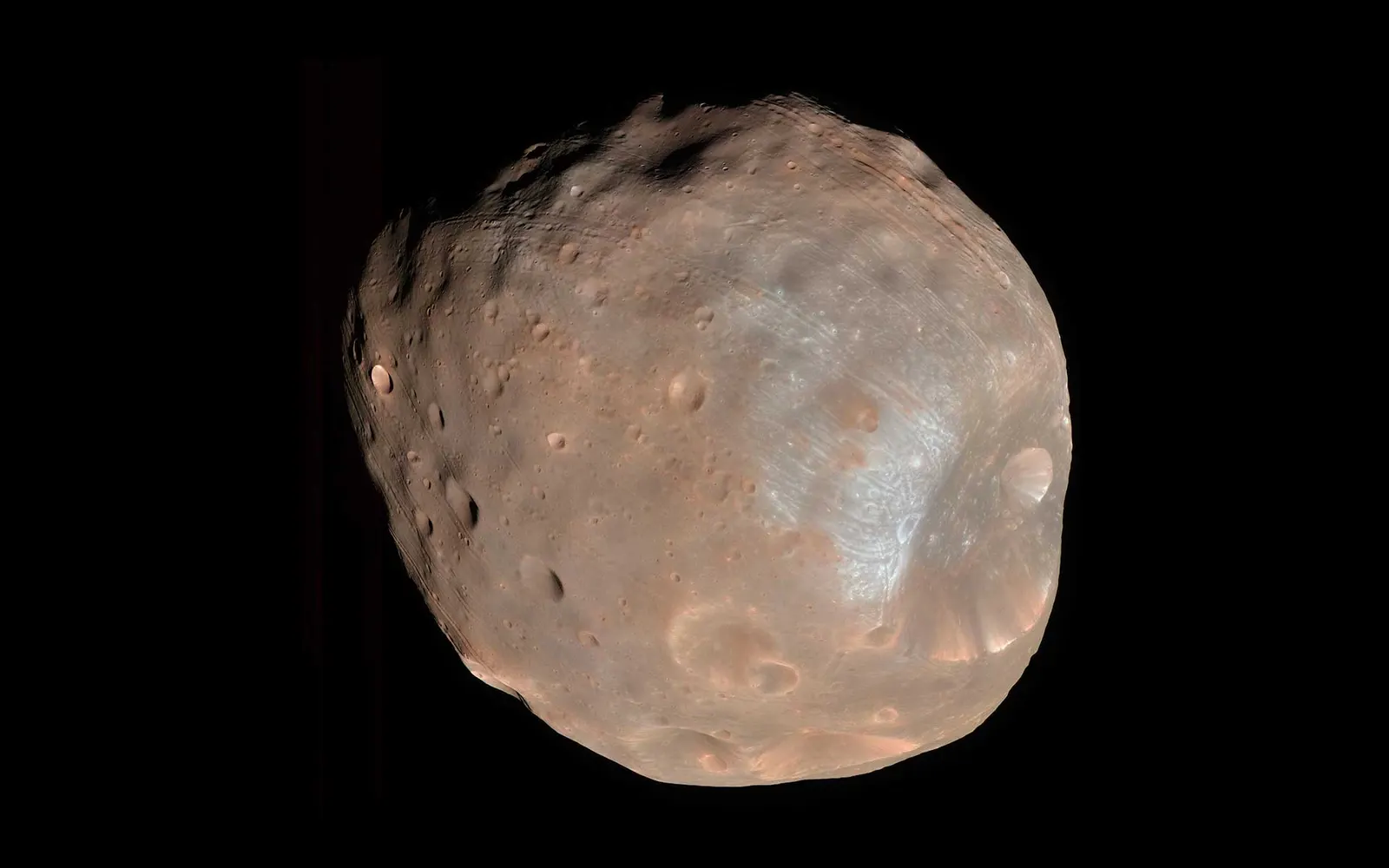 NASA image of Phobos; NASA’s Mars Reconnaissance Orbiter / HiRISE. NASA/JPL-Caltech/University of Arizona credit as indicated by the NASA image page. Original page: https://science.nasa.gov/mars/moons/ (Phobos image). NASA imagery is generally not copyrighted in the United States; retain stated credit and check third-party markings on the original page.