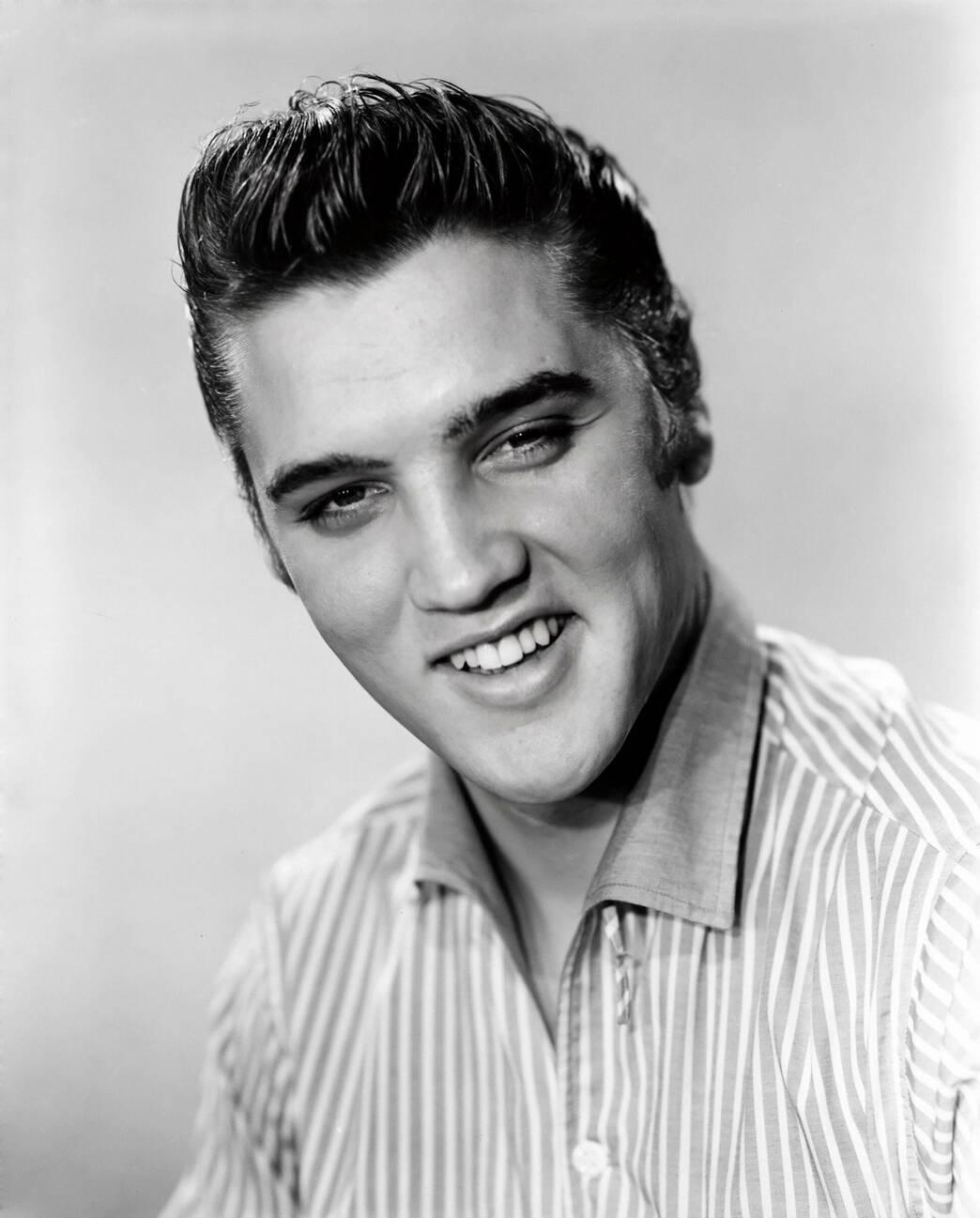 Elvis Presley publicity photo, 1956. Author Edward Roth; Wikimedia Commons file page https://commons.wikimedia.org/wiki/File:Elvis_Presley_Publicity_Photo,_1956.jpg; U.S. public domain, published 1956 without copyright notice as documented on file page. No attribution required; credit Edward Roth when practical.