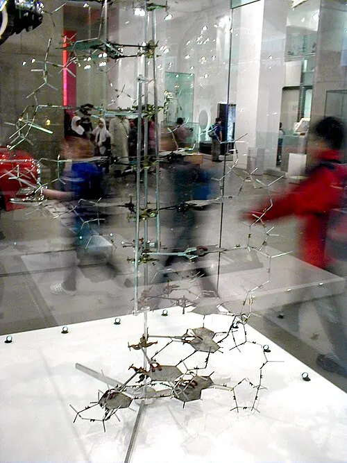 Crick and Watson’s 1953 DNA model on display at the Science Museum, London. Commons file page: https://commons.wikimedia.org/wiki/File:DNA_Model_Crick-Watson.jpg. Public domain worldwide, released by author Alkivar. Credit “Alkivar / Wikimedia Commons”; 500×667 JPEG thumbnail, no further edits; checked 2026-10-16.