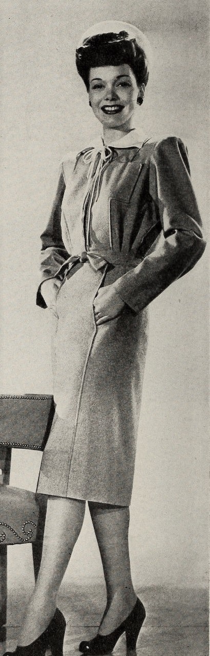 actress Jane Wyman wearing a dress by American designer Leah Rhodes, from Cine Mundial, March 1943. Photographer uncredited. Original: https://commons.wikimedia.org/wiki/File:Jane_Wyman_is_wearing_a_dress_by_Leah_Rhodes,_1943.jpg. Public domain in the United States; published 1943, copyright not renewed. Unmodified.