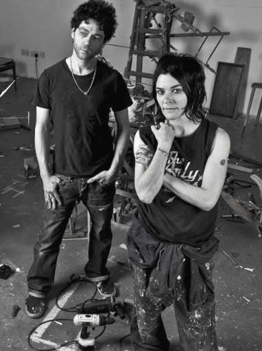 Portrait of Tim Noble and Sue Webster in their studio, March 2011. Original page: https://commons.wikimedia.org/wiki/File:Tim_Noble_Sue_Webster_2011.jpg. Photographers: Lorna Newman and Danielle Geraghty (2 Shooters Photography); attribution-only permission confirmed by Wikimedia VRT, allowing reuse with credit. Credit: Lorna Newman & Danielle Geraghty / 2 Shooters Photography. No edits. Retrieved 2026-10-28.