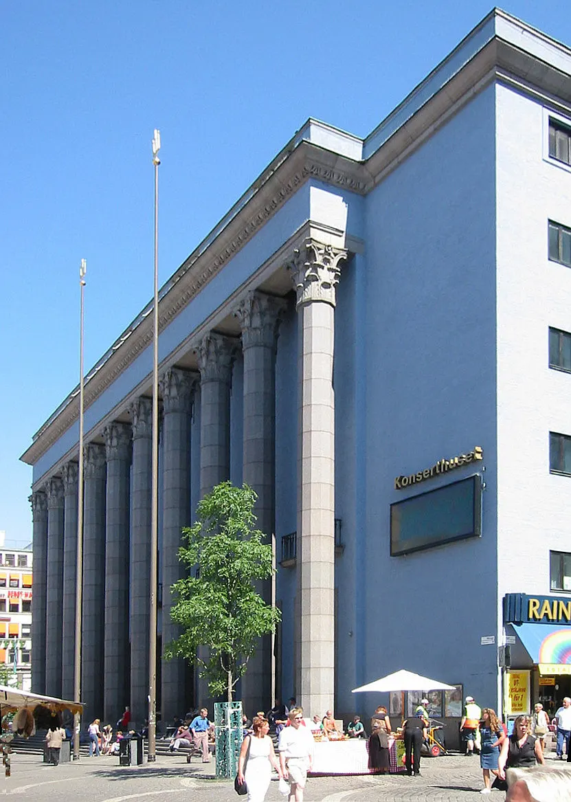 Stockholm Concert Hall, where the Nobel Prize award ceremony is held; photographer anonymous, Wikimedia Commons, https://commons.wikimedia.org/wiki/File:Stockholm_Konserthuset_2002.jpg; CC BY-SA 3.0 (https://creativecommons.org/licenses/by-sa/3.0/). Attribution: anonymous photographer, via Wikimedia Commons, CC BY-SA 3.0. Original file, no edits; checked 2026-10-18.